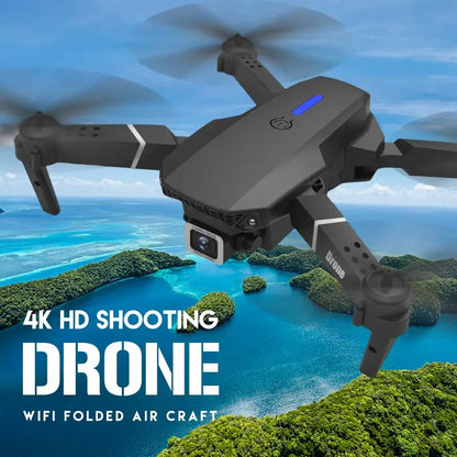 E88 Pro black foldable RC drone with camera over a scenic landscape, featuring text '4K HD Shooting Drone' and 'WiFi Folded Air Craft'
