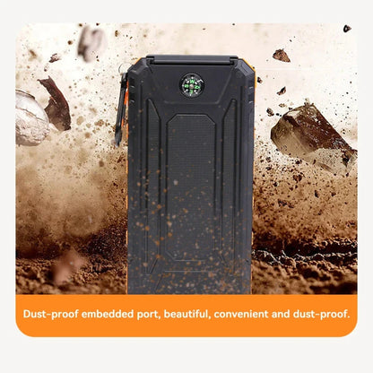 Dust-proof power bank with rugged design on a background of dirt and rocks.