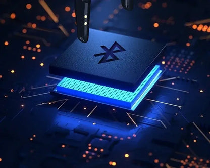 Close-up of a Bluetooth chip on a circuit board with glowing blue accents
