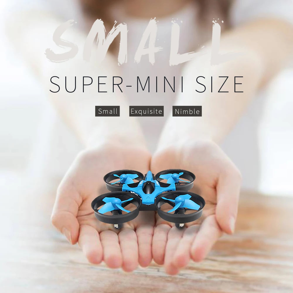 Small drone held in hands with text highlighting 'super-mini size' on a blurred background
