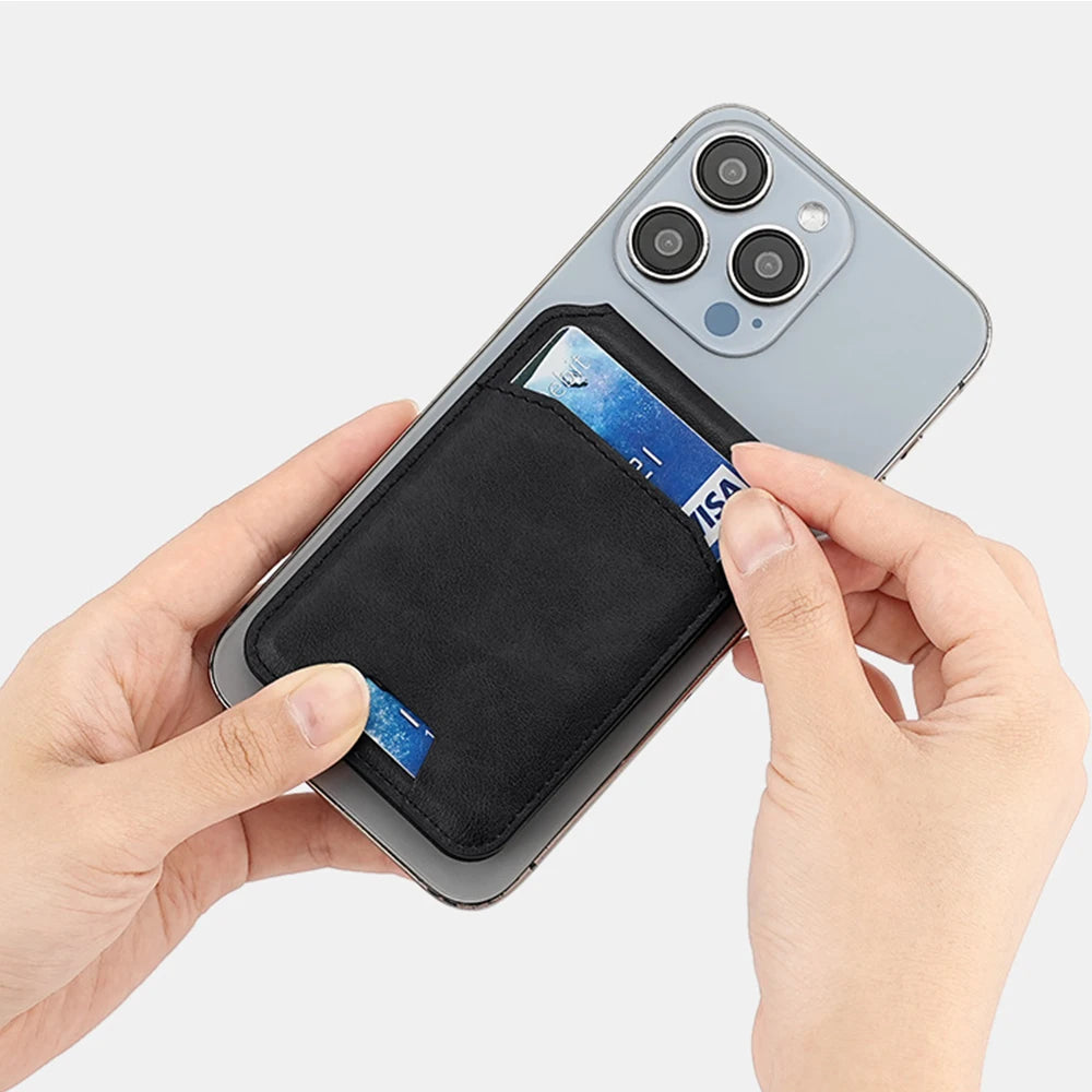 Person inserting a card into a phone case with a white background