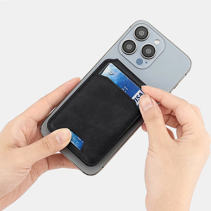 Person inserting a card into a phone case with a white background