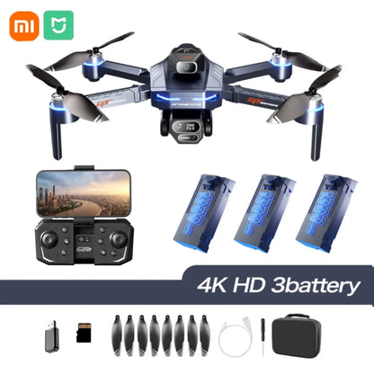 Drone with accessories including remote control, batteries, propellers, and carrying case on a white background.