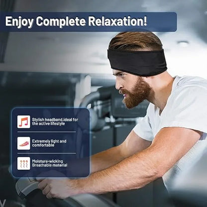 Man wearing a black headband with product features highlighted on a blurred gym background