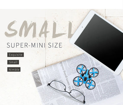 Small drone on a newspaper with a tablet and glasses, labeled 'Super-mini size'.